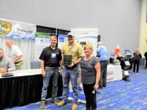 Ave Maria Utility Company winner pictured with FSAWWA
