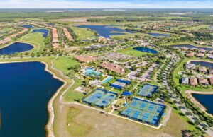 Aerial of Del Webb Naples amenity campus and homes in Ave Maria, FL