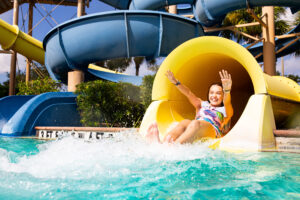 Ave Maria resident slides down slide at Ave Maria Water Park